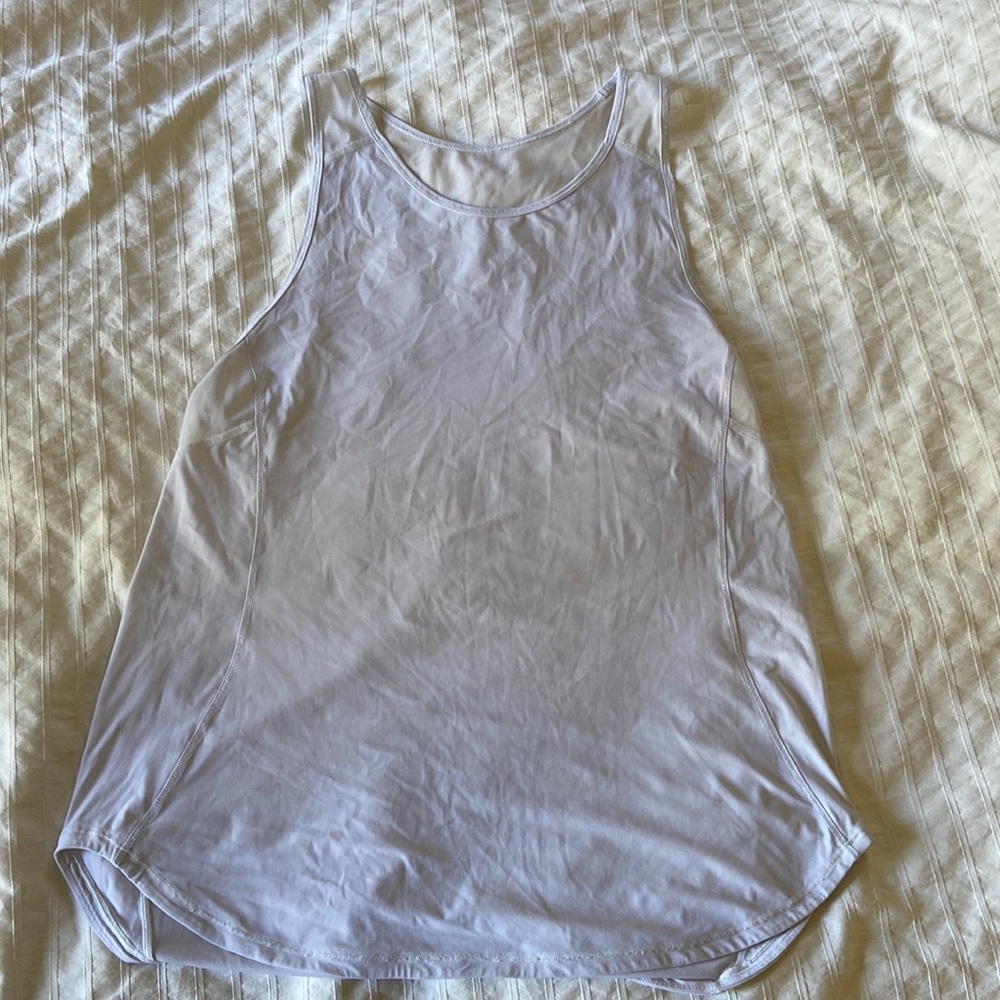 White lululemon workout tank with mesh cutouts